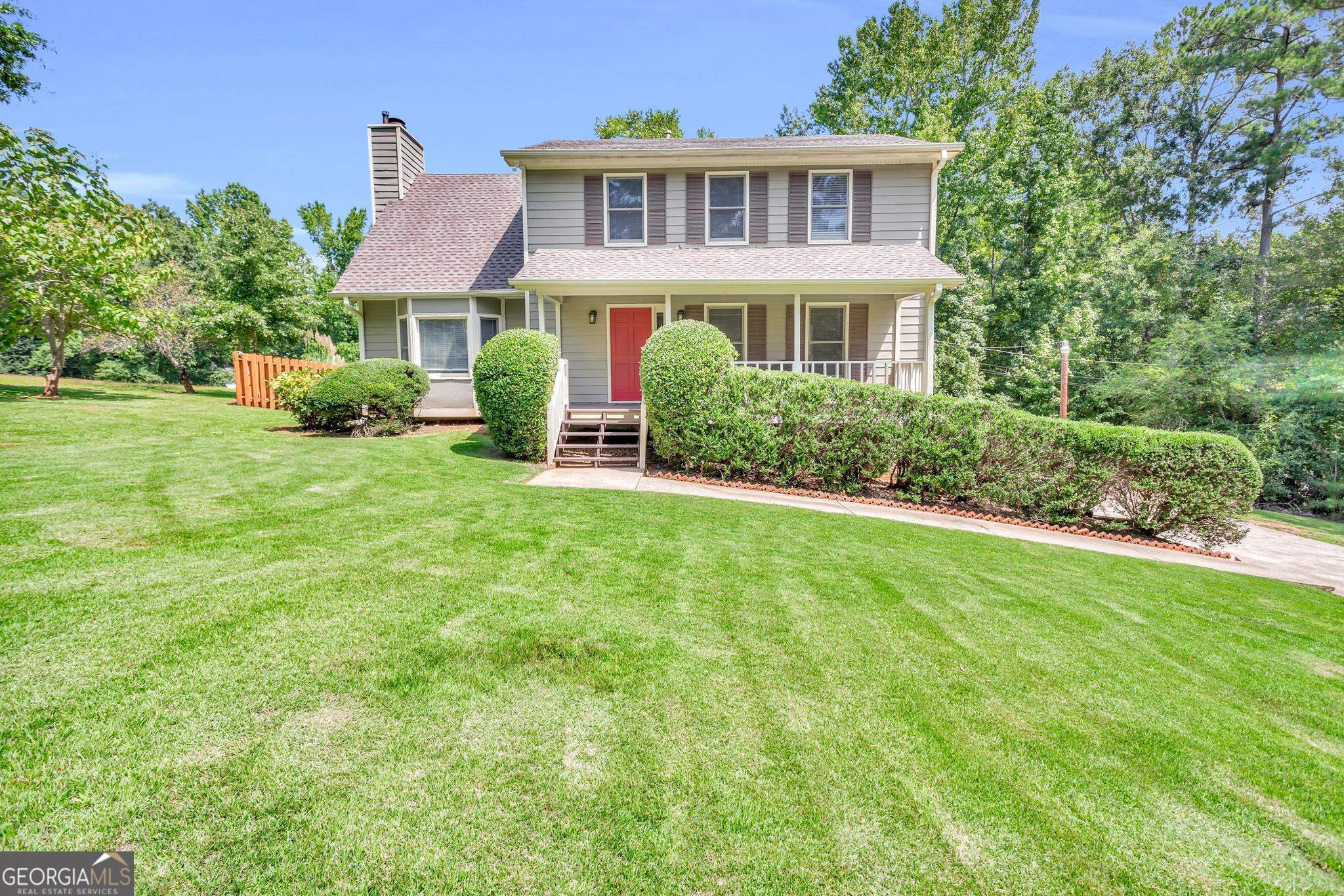 370 Michael Road Tyrone, GA 30290 - Photo 1 of 1 a front view of a house with a yard
