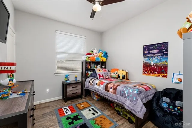 a bedroom with bed and a window