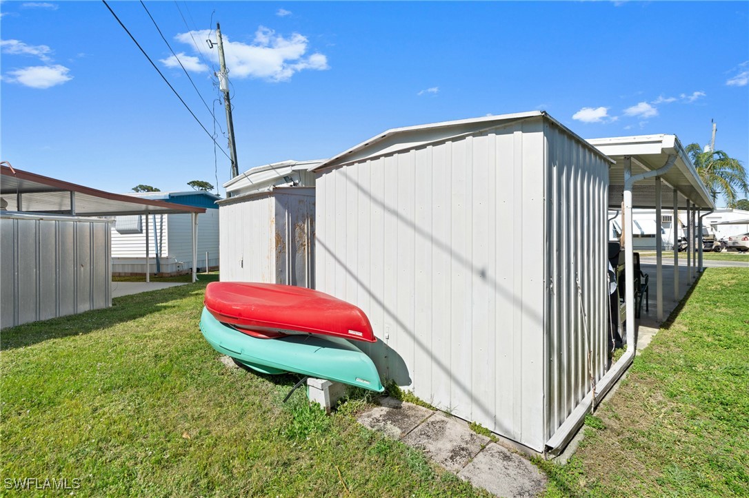 20550 Basin Drive Estero, FL 33928 - Photo 33 of 34 a view of a porch with a backyard