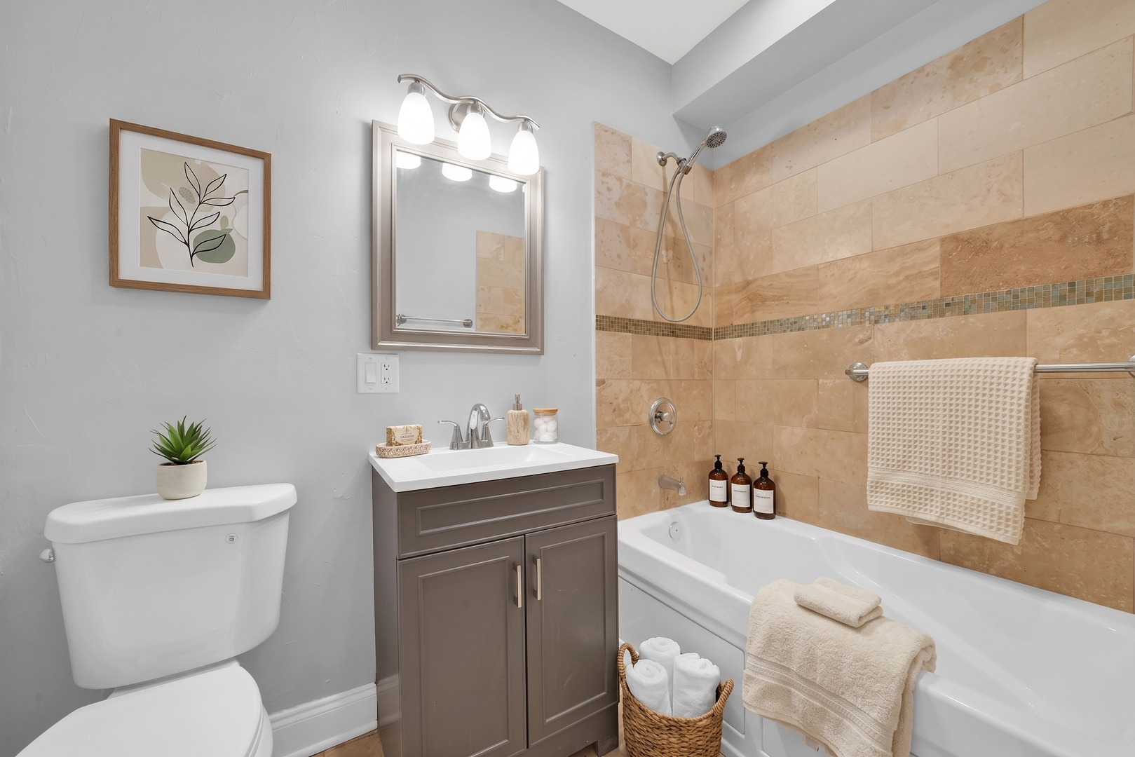 2256 West Arthur Avenue, Unit 2 Chicago, IL 60645 - Photo 15 of 22 a bathroom with a granite countertop sink mirror and toilet