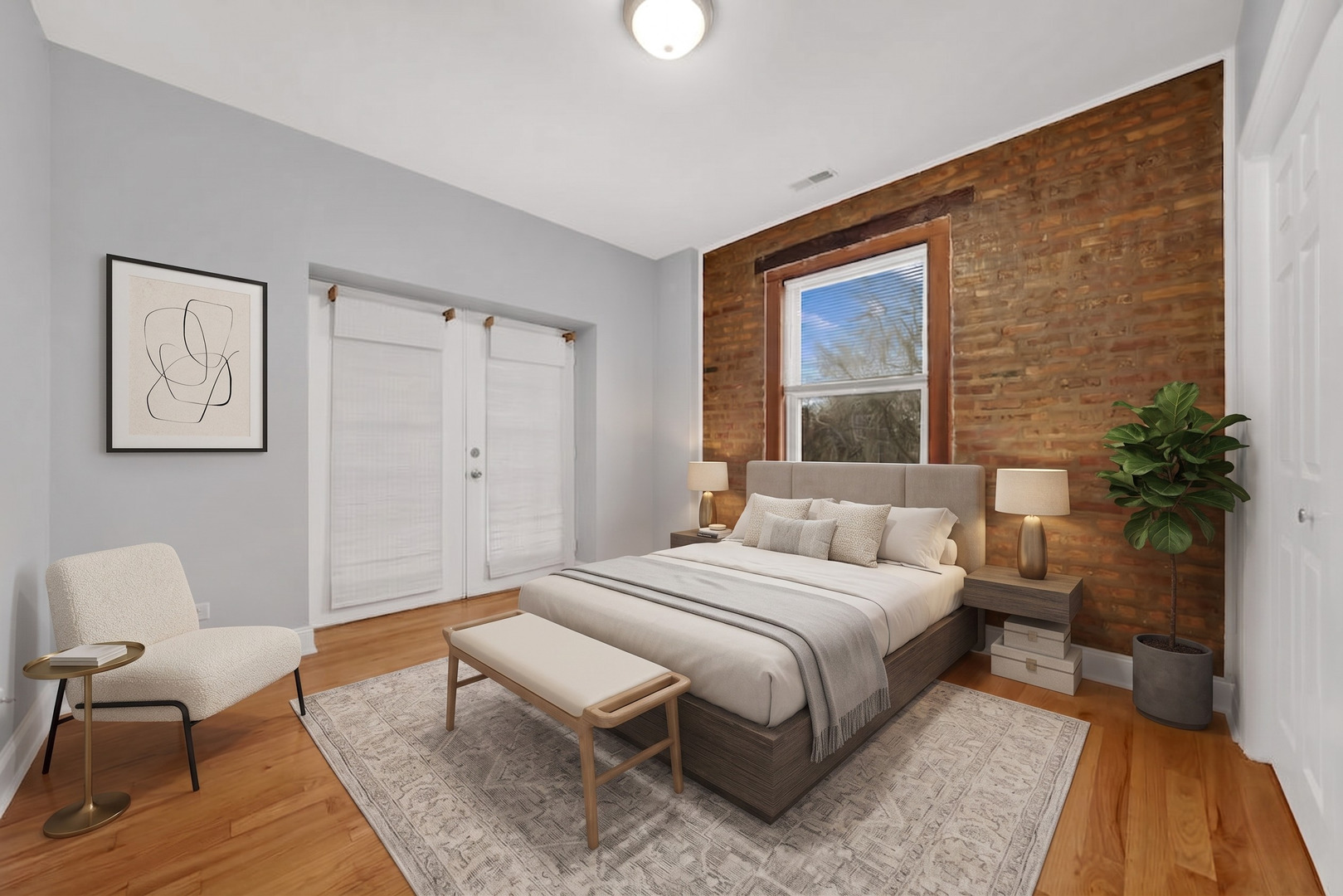 2256 West Arthur Avenue, Unit 2 Chicago, IL 60645 - Photo 17 of 22 a bedroom with a bed and a chair