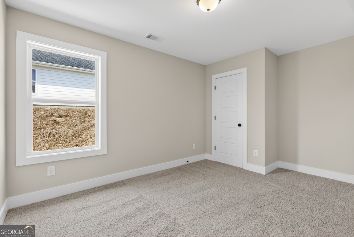 97 Wards Creek Road, Unit 1 Toccoa, GA 30577 - Photo 34 of 55 a view of an empty room with a window