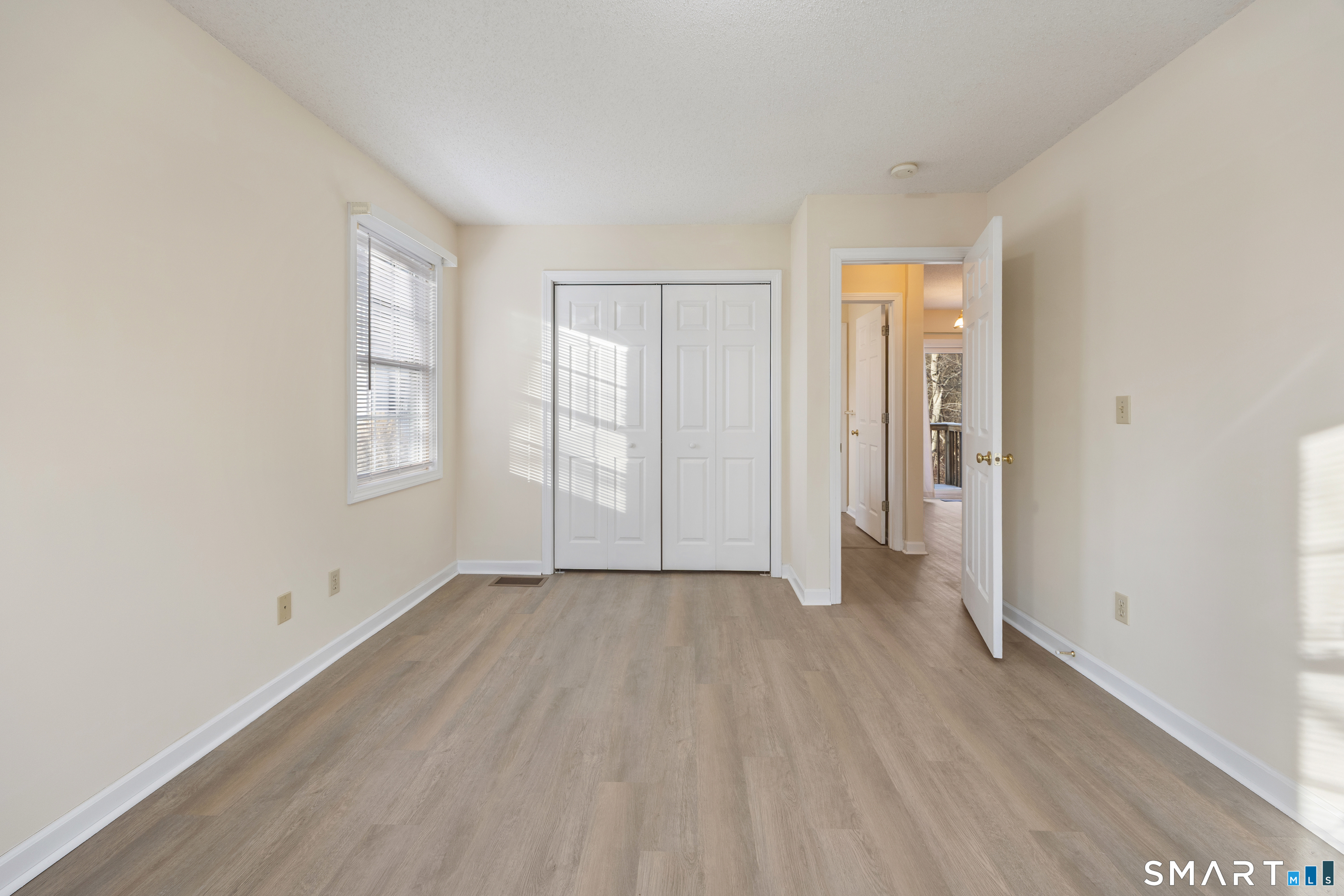 454 Maple Avenue Bristol, CT 06010 - Photo 15 of 27 an empty room with windows and closet