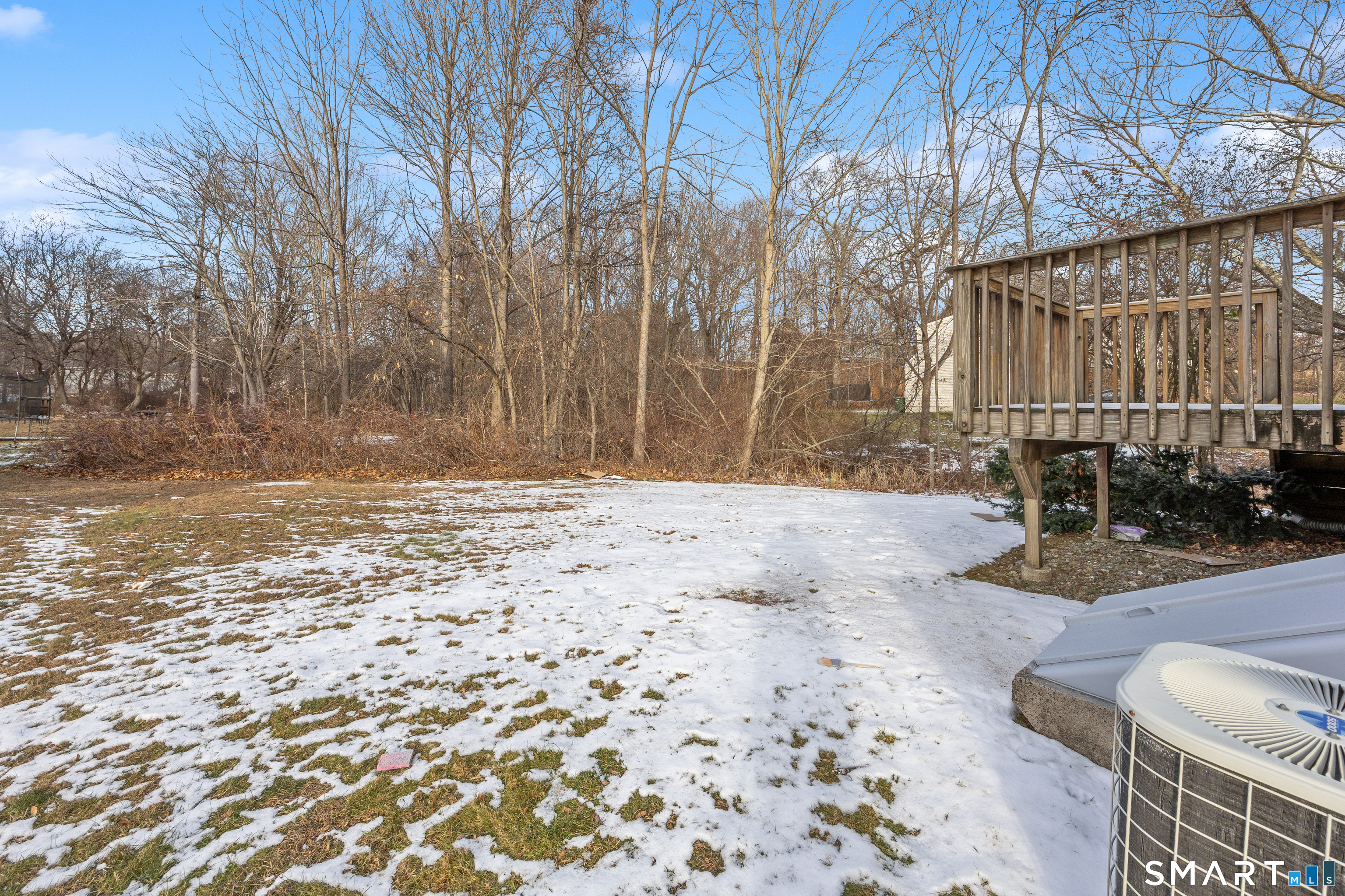 454 Maple Avenue Bristol, CT 06010 - Photo 21 of 27 a view of yard covered with snow in front of house