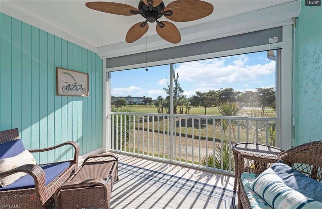 476 Bristle Cone Lane, Unit 39 Naples, FL 34113 - Photo 7 of 16 Sunroom with ceiling fan and a balcony