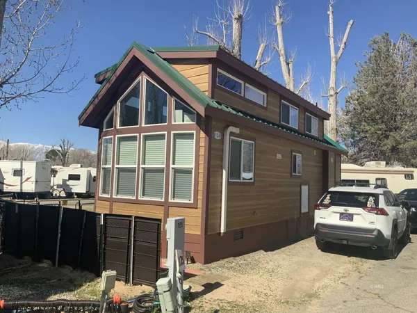 a car parked in front of a house
