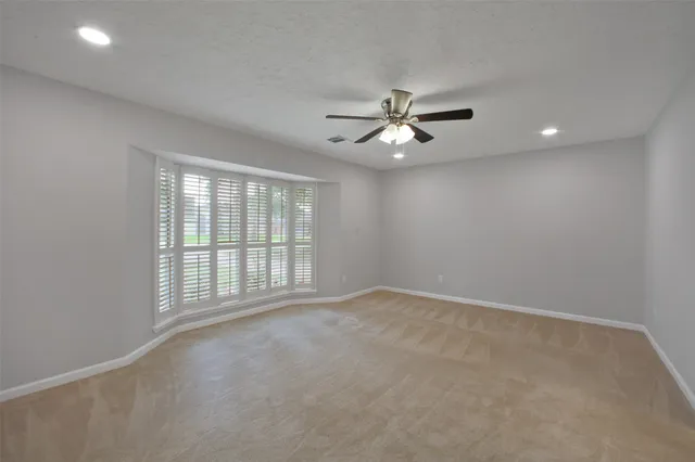 a bathroom with a sink vanity and a mirror