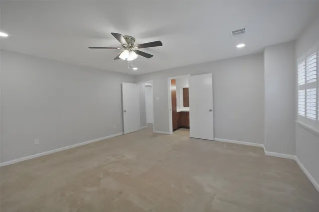 a front view of a house with a garden and porch