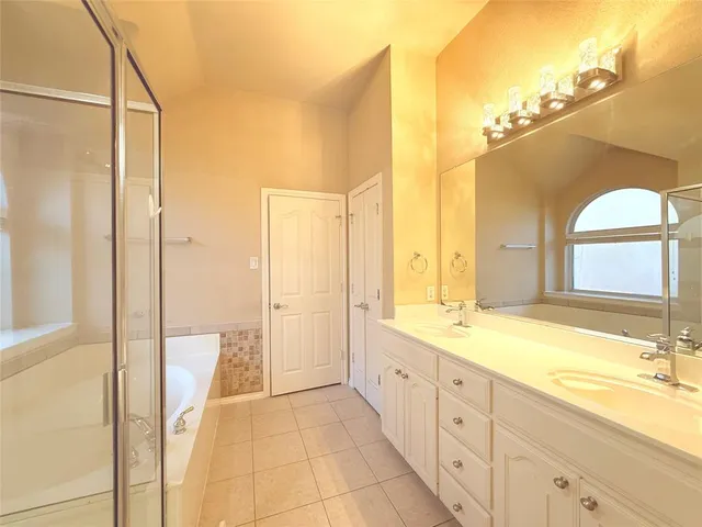 a bathroom with a granite countertop sink mirror and a