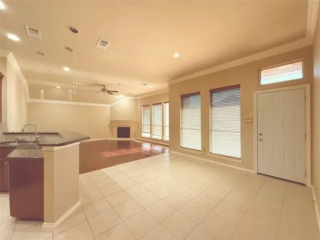 a view of a kitchen with furniture and a kitchen
