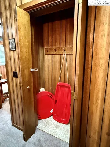 a bathroom with a tub and shower curtain
