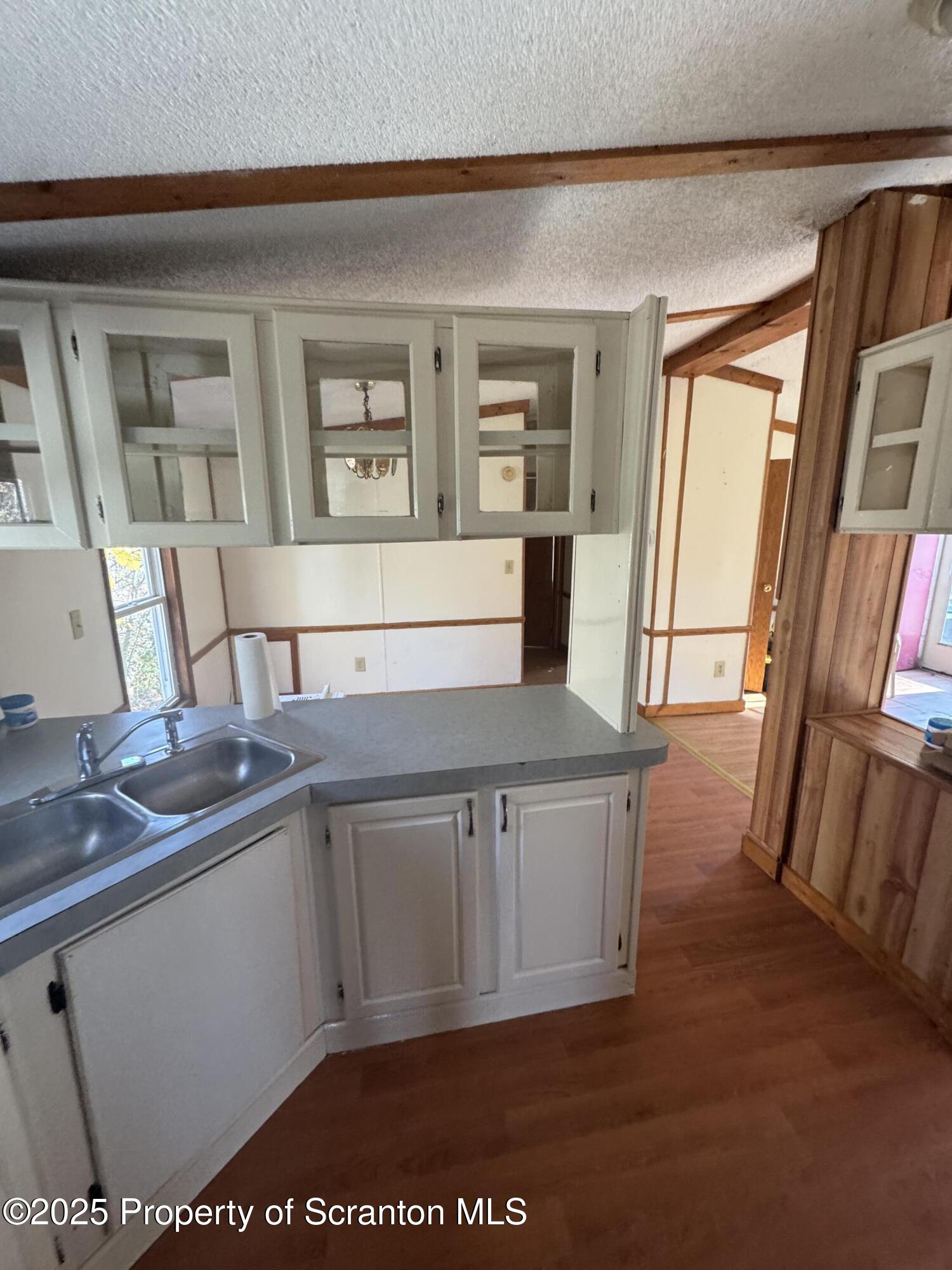 1125 Hall Road New Milford, PA 18834 - Photo 12 of 18 a view of living room with granite countertop furniture and a fireplace