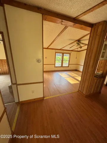 a view of living room with granite countertop furniture and a fireplace