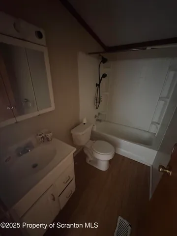 a bathroom with a sink and a vanity