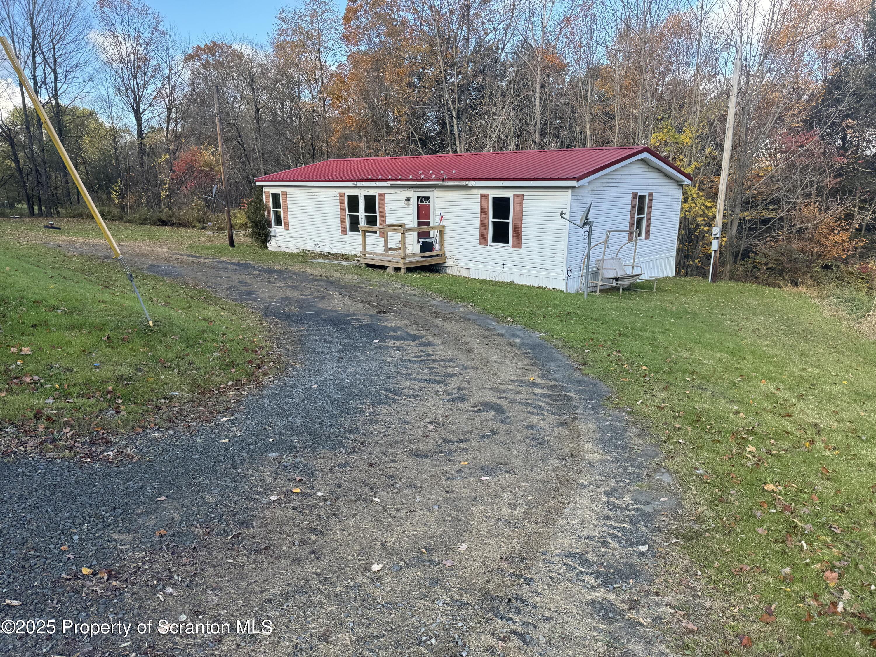 1125 Hall Road New Milford, PA 18834 - Photo 2 of 18 a view of house with outdoor space