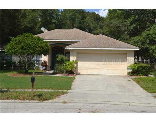 2660 Tall Maple Loop Ocoee, FL 34761 - Photo 1 of 1 a aerial view of a house with a yard