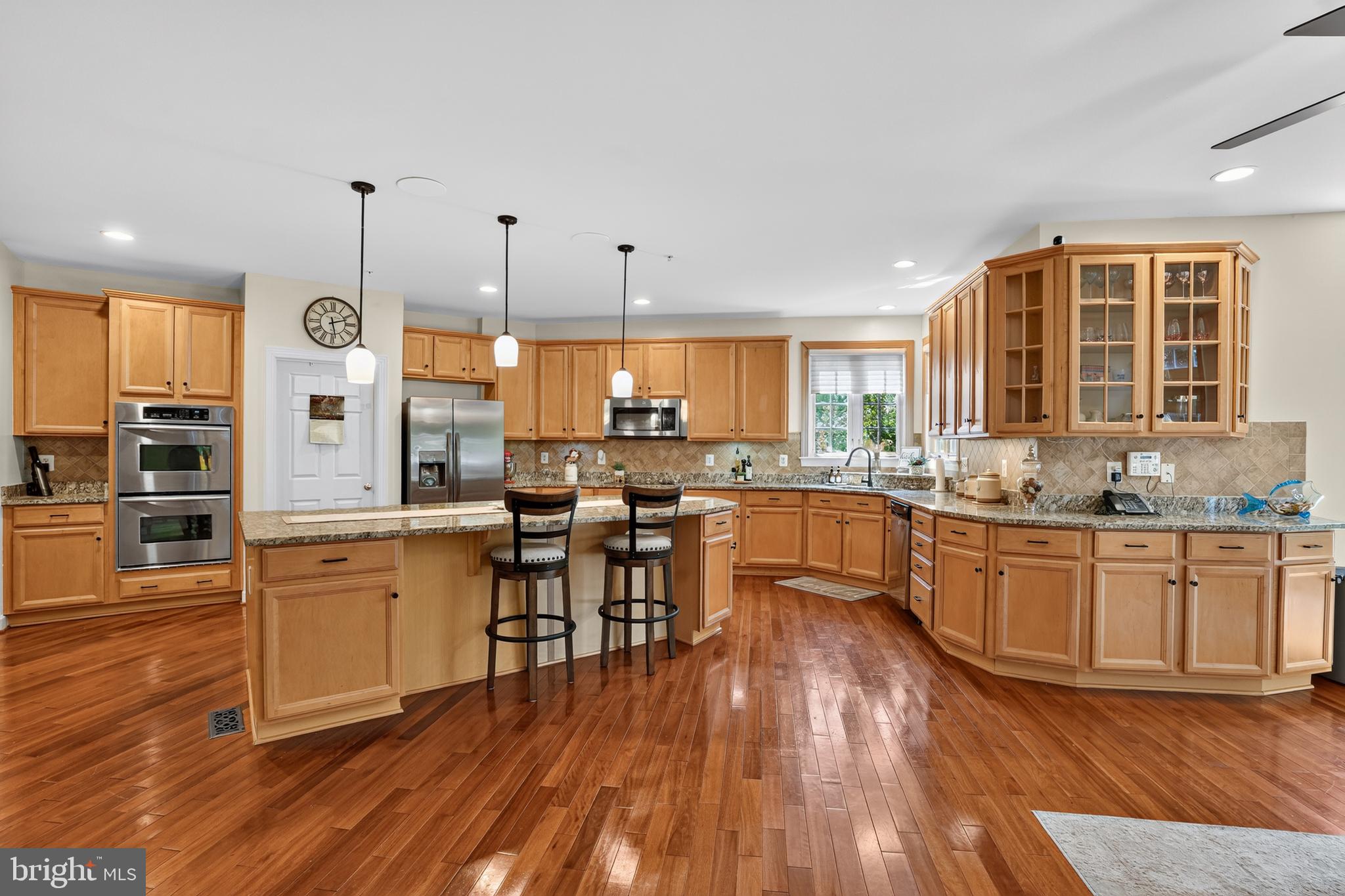 1419 Atwood Road Silver Spring, MD 20906 - Photo 10 of 48 Spacious kitchen with warm wood tones.