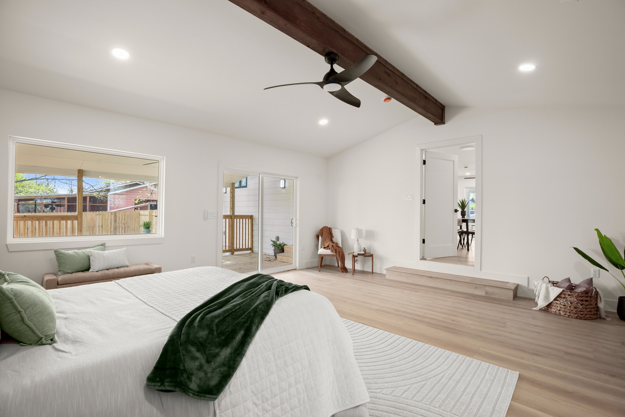 3308 Touchstone Street Austin, TX 78723 - Photo 20 of 38 a bedroom with a bed and wooden floor