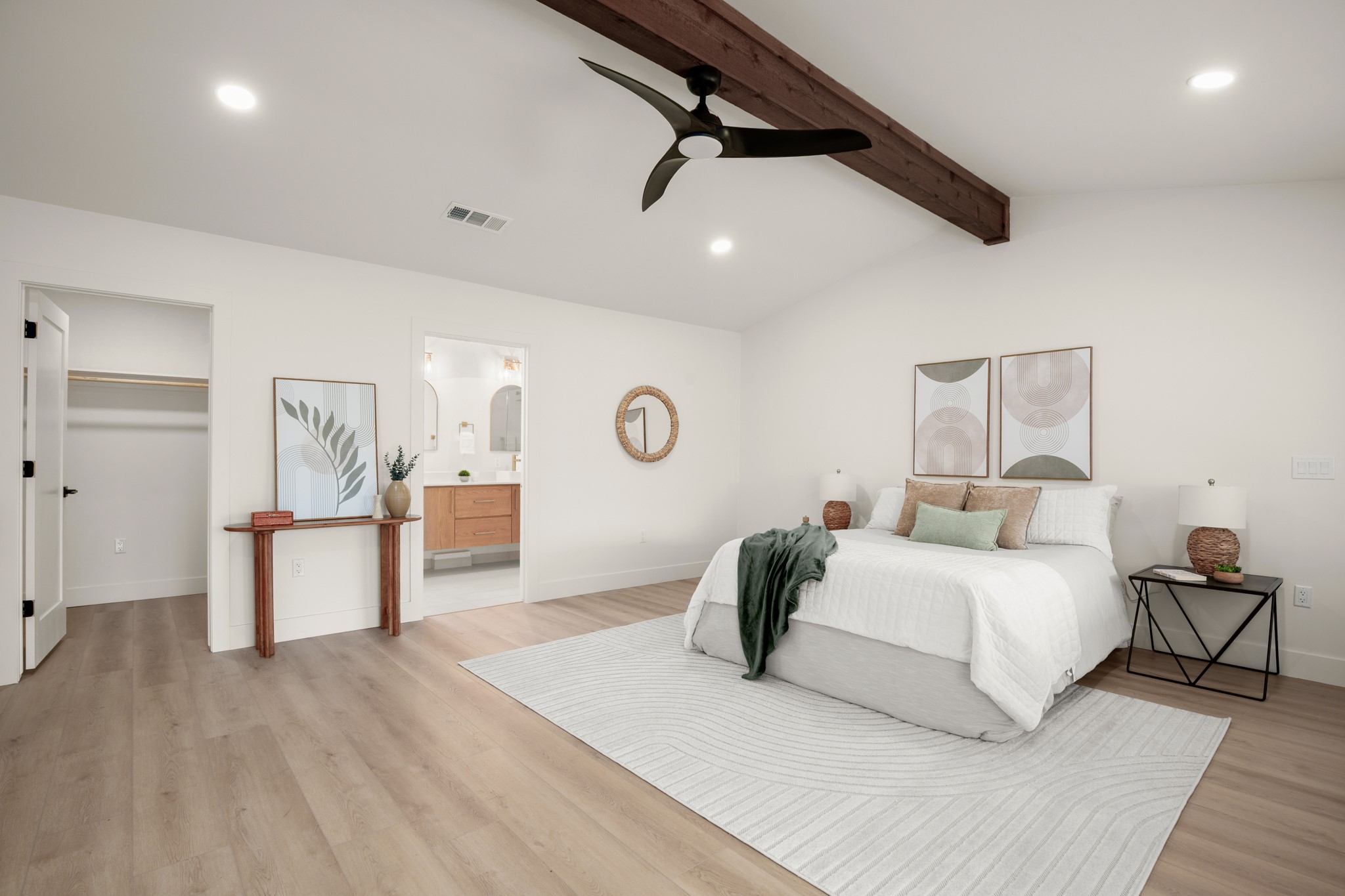 3308 Touchstone Street Austin, TX 78723 - Photo 21 of 38 Bedroom featuring recessed lighting, lofted ceiling with beams, a walk in closet, light wood-style floors, and a ceiling fan