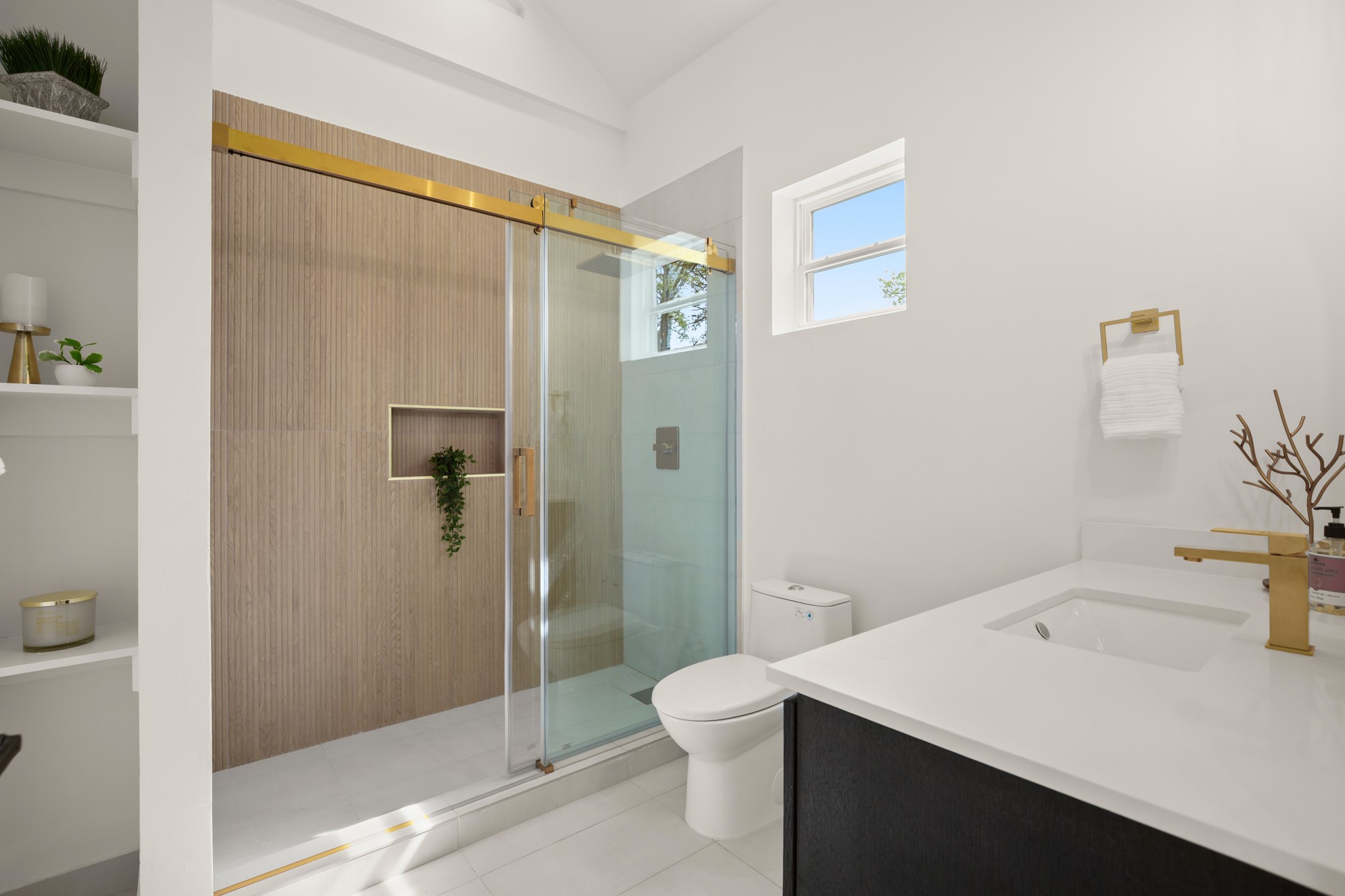 3308 Touchstone Street Austin, TX 78723 - Photo 28 of 38 Full bath with vanity, a stall shower, lofted ceiling, and light tile patterned flooring