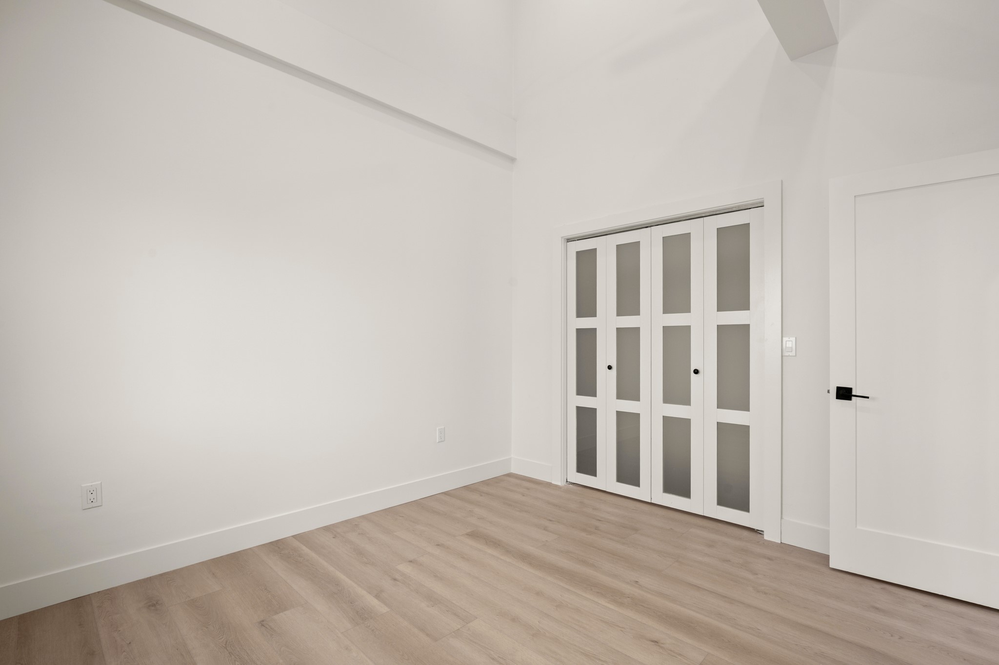 3308 Touchstone Street Austin, TX 78723 - Photo 31 of 38 a view of an empty room with wooden floor and a window