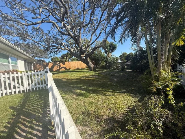 a view of swimming pool with a garden