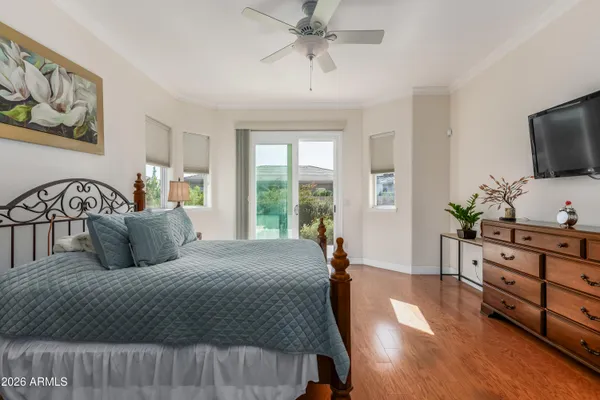 a spacious bathroom with a granite countertop sink a toilet and a bathtub