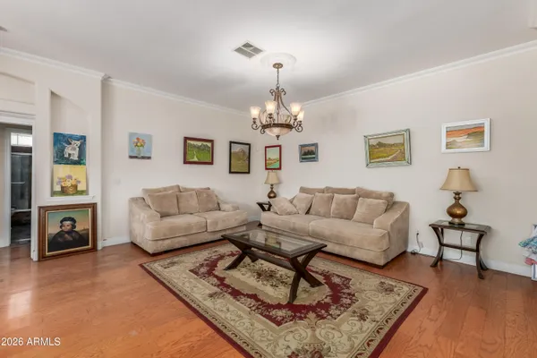 a living room with furniture and a rug
