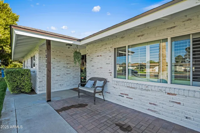 a view of an entryway with a wooden door