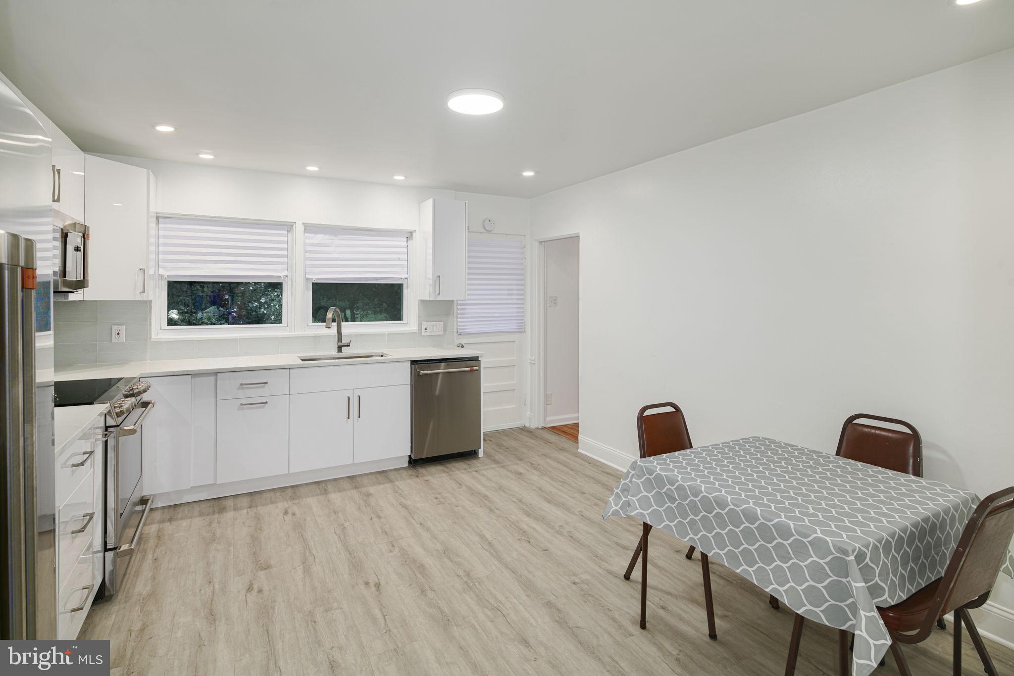 7908 Rolling Green Road Cheltenham, PA 19012 - Photo 6 of 35 New Kitchen w/Exit to Rear Patio