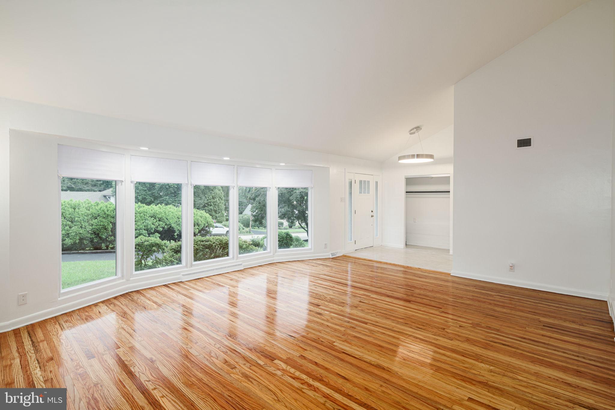 7908 Rolling Green Road Cheltenham, PA 19012 - Photo 9 of 35 Living Room w/Vaulted Ceiling
