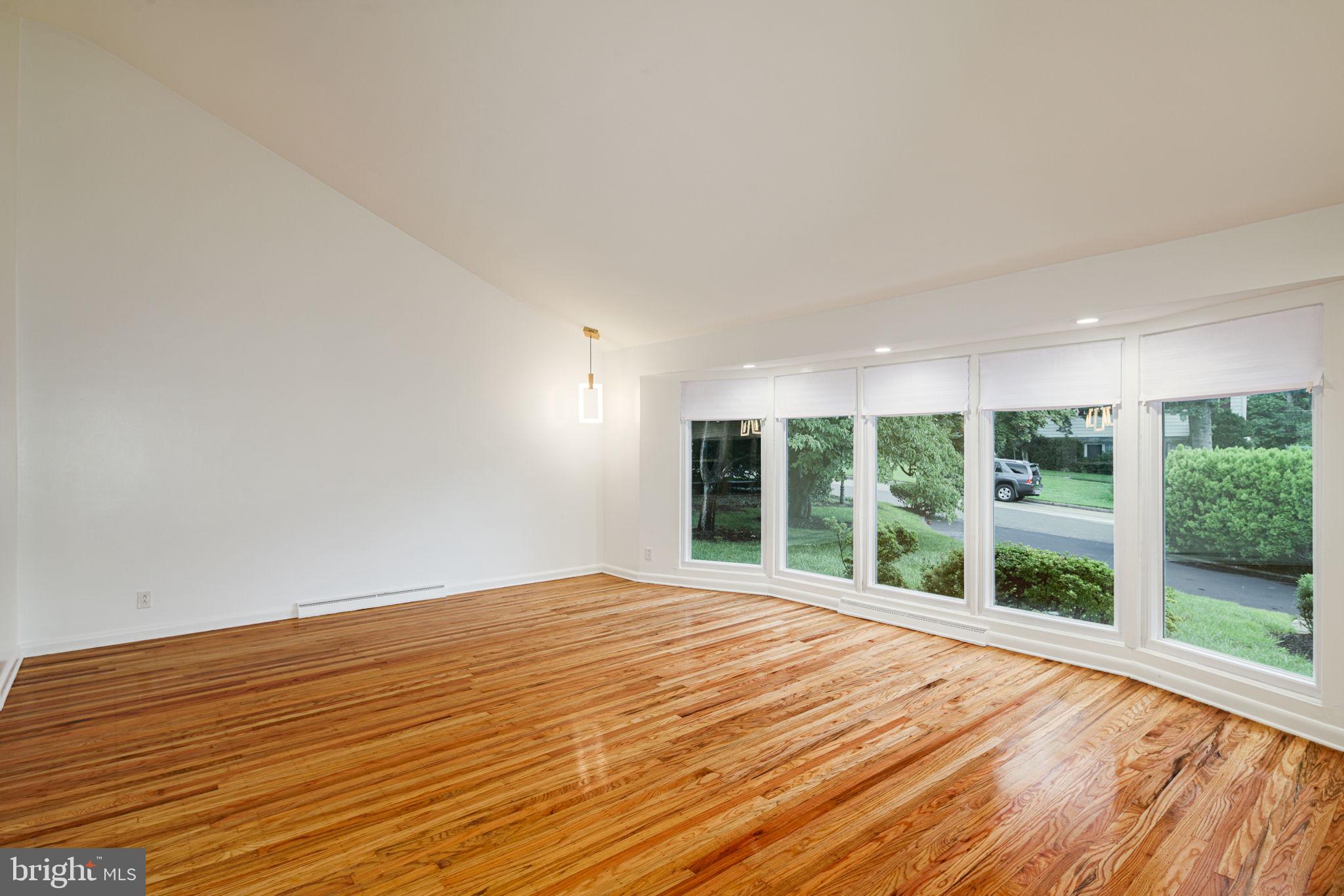 7908 Rolling Green Road Cheltenham, PA 19012 - Photo 10 of 35 Living Room w/Vaulted Ceiling