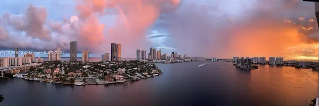 a view of a city with ocean