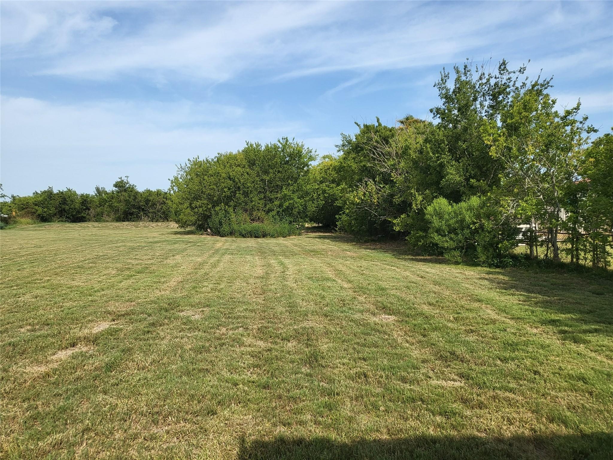 333 24th Street San Leon, TX 77539 - Photo 16 of 36 a view of a yard with an outdoor space