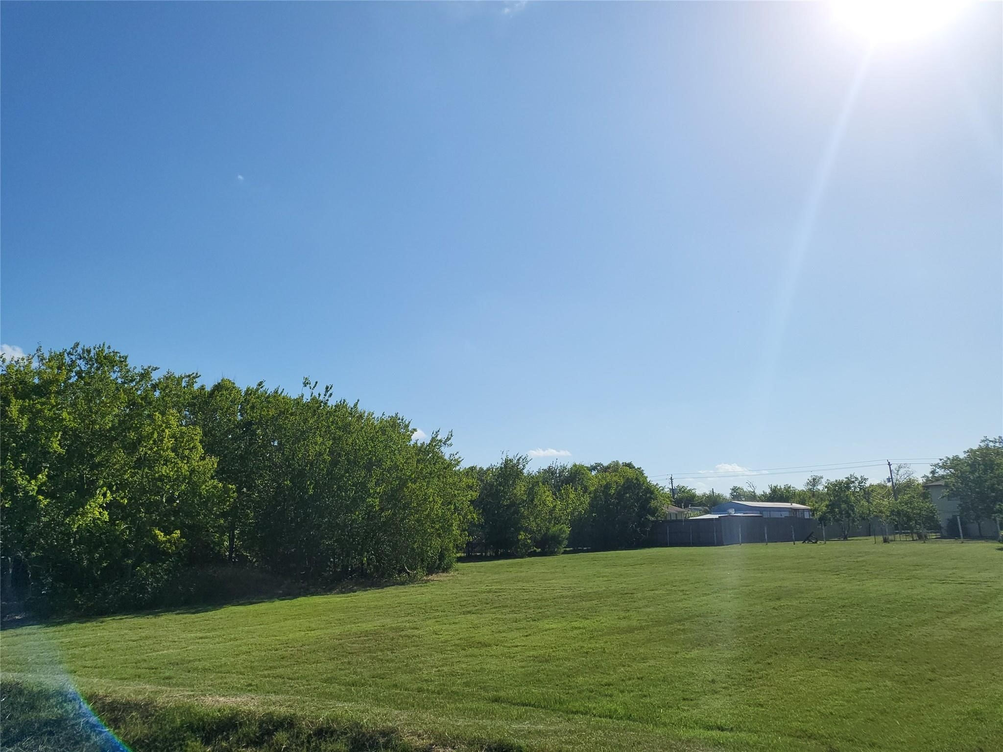 333 24th Street San Leon, TX 77539 - Photo 5 of 36 a view of a field with an ocean