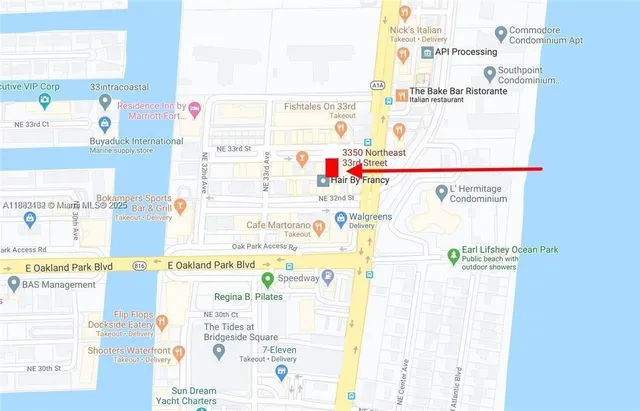 view of a book and a white refrigerator