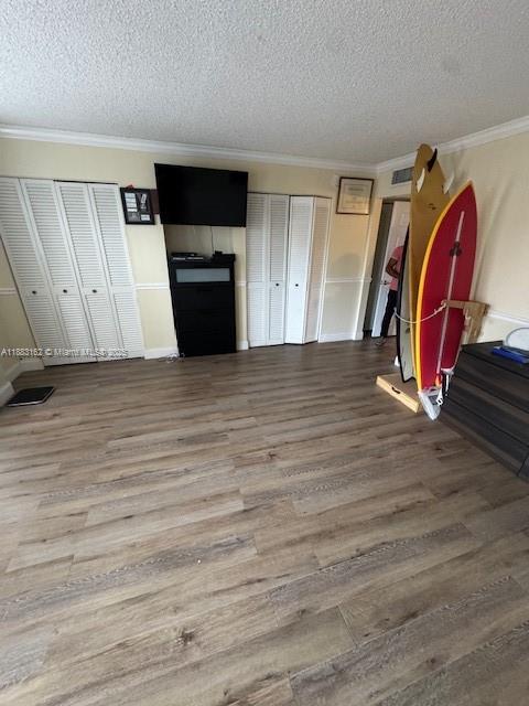 3356 Northeast 33rd Street, Unit 6 Fort Lauderdale, FL 33308 - Photo 5 of 21 a view of a livingroom with wooden floor