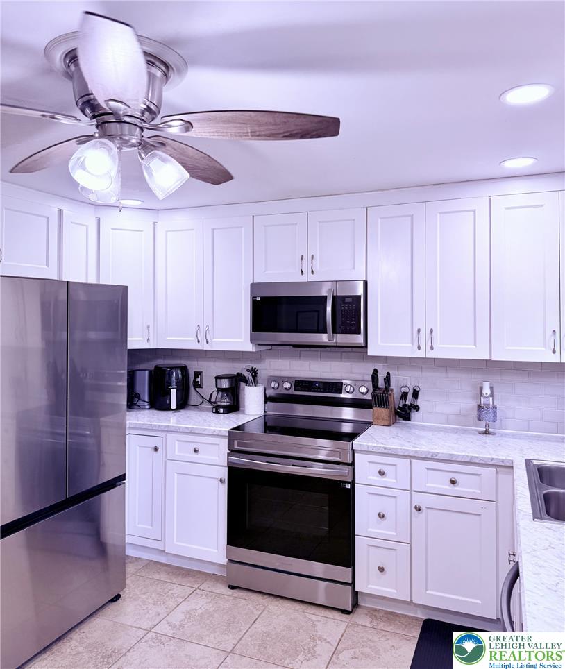 1275 Macada Road Bethlehem, PA 18017 - Photo 25 of 87 a kitchen with cabinets a sink and stainless steel appliances