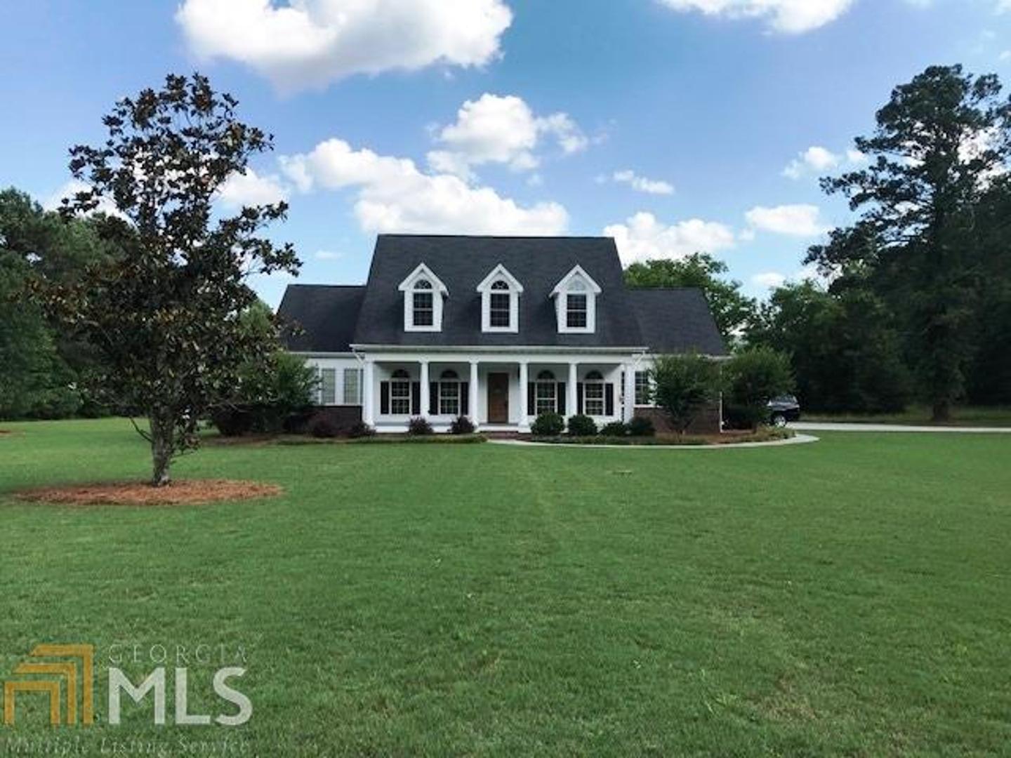 1193 Horseleg Creek Road Southwest Rome, GA 30165 - Photo 1 of 1 a front view of a house with a yard