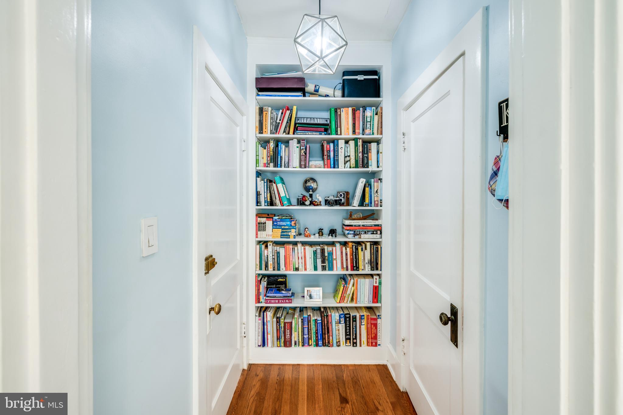 3409 29th Street Northwest, Unit 1 Washington, DC 20008 - Photo 4 of 23 Cheerful foyer with built in and coat closet