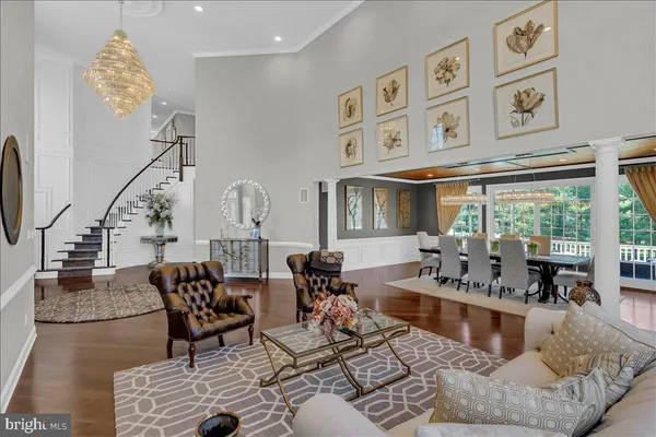 a living room with furniture or couch and a large window