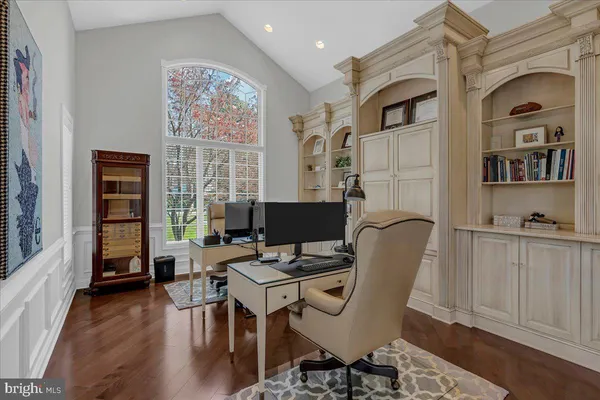 a workspace with furniture and a window