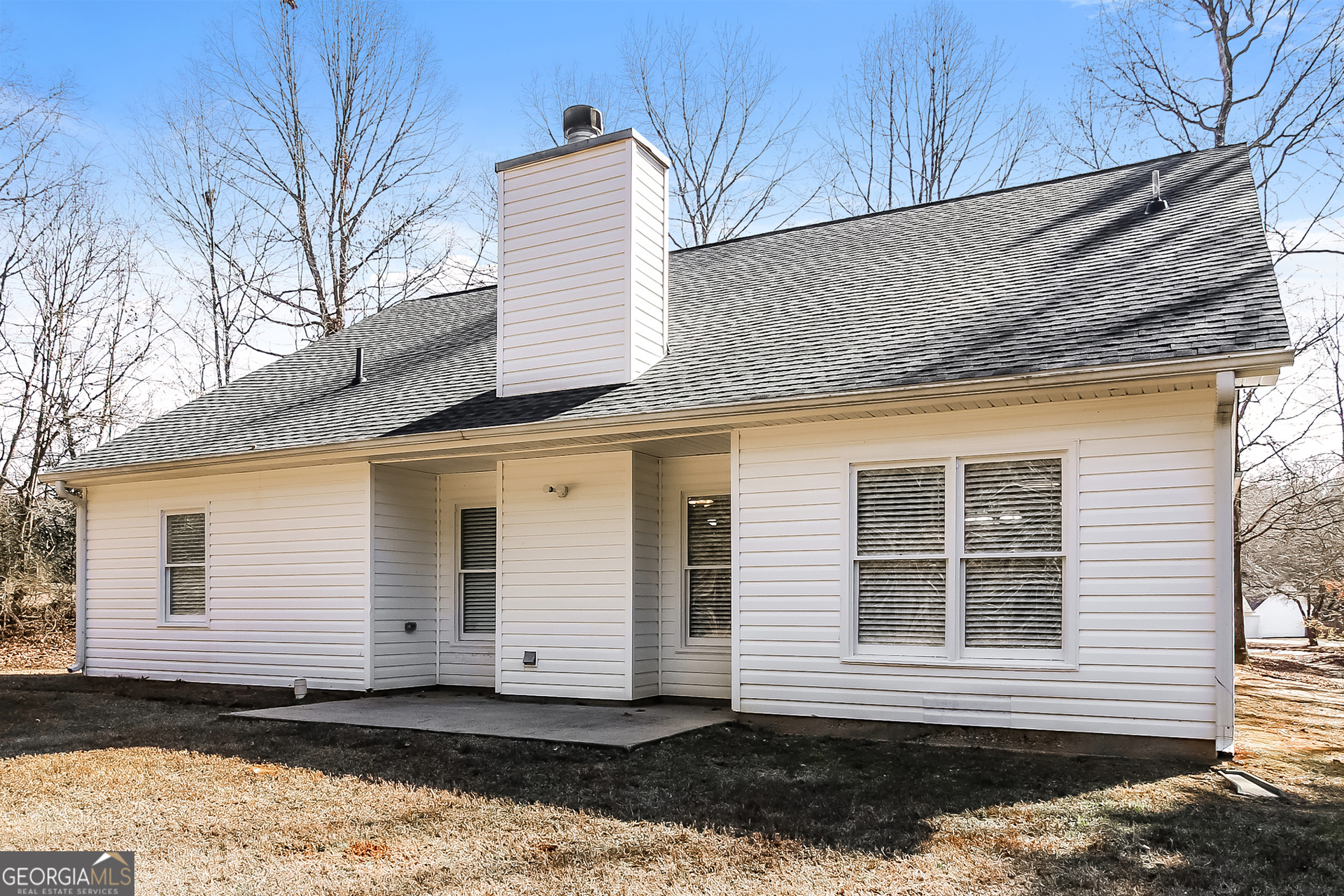 355 Freeman Drive Covington, GA 30016 - Photo 15 of 17 a front view of a house with a yard