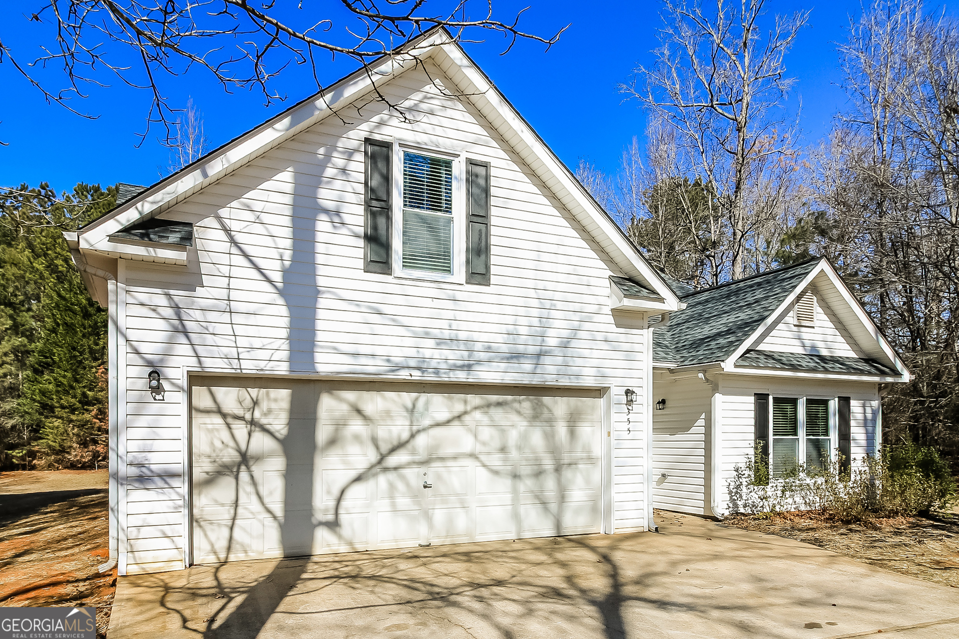355 Freeman Drive Covington, GA 30016 - Photo 3 of 17 a front view of a house with a yard