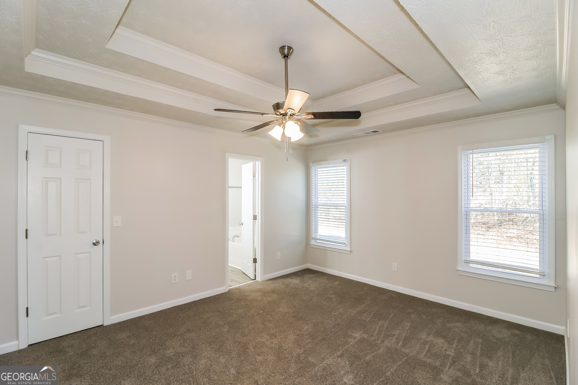 355 Freeman Drive Covington, GA 30016 - Photo 9 of 17 a view of an empty room with a window
