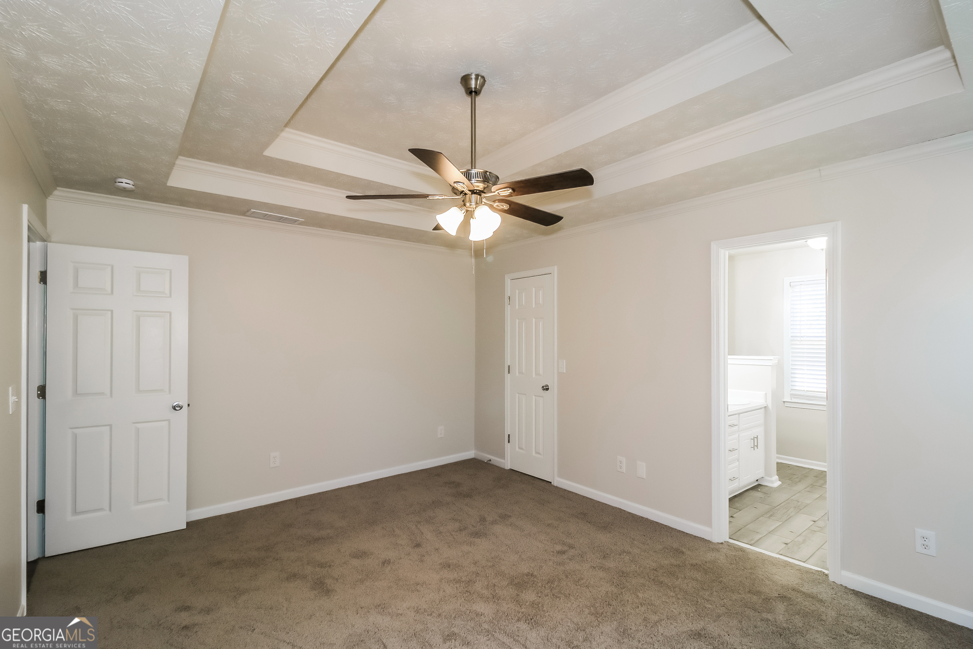355 Freeman Drive Covington, GA 30016 - Photo 10 of 17 a view of a room with a ceiling fan