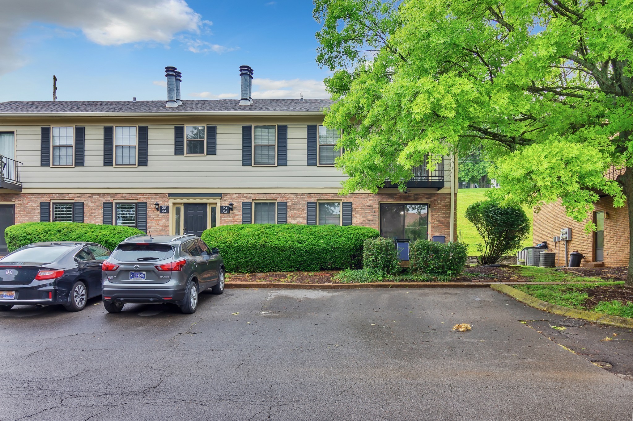 764 Fox Ridge Drive Brentwood, TN 37027 - Photo 2 of 12 a cars parked in front of a building