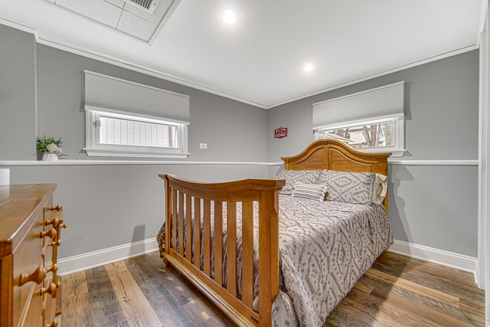 369 Hickory Road Lake Zurich, IL 60047 - Photo 17 of 25 a bedroom with bed and wooden floor