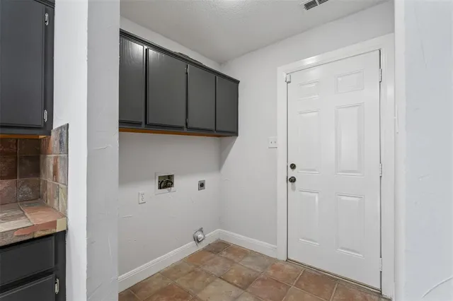 a view of a livingroom with a flat screen tv