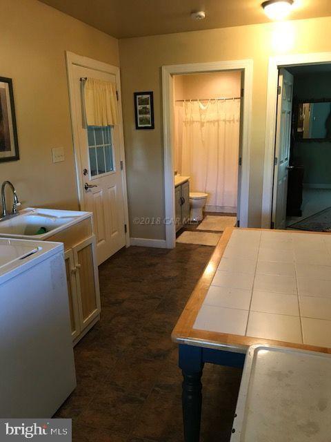 2700 Elsey Road Nanticoke, MD 21840 - Photo 23 of 43 a room with storage and utility